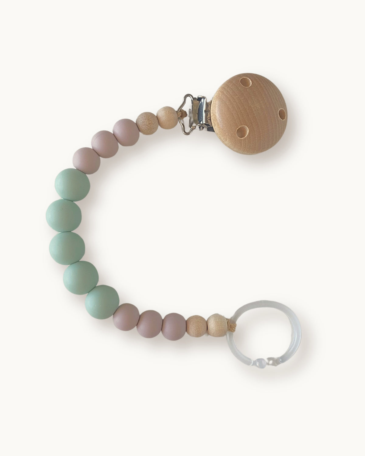 Catenella portaciuccio in silicone tonalità menta e marrone rosé, in legno e anello per ciuccio.