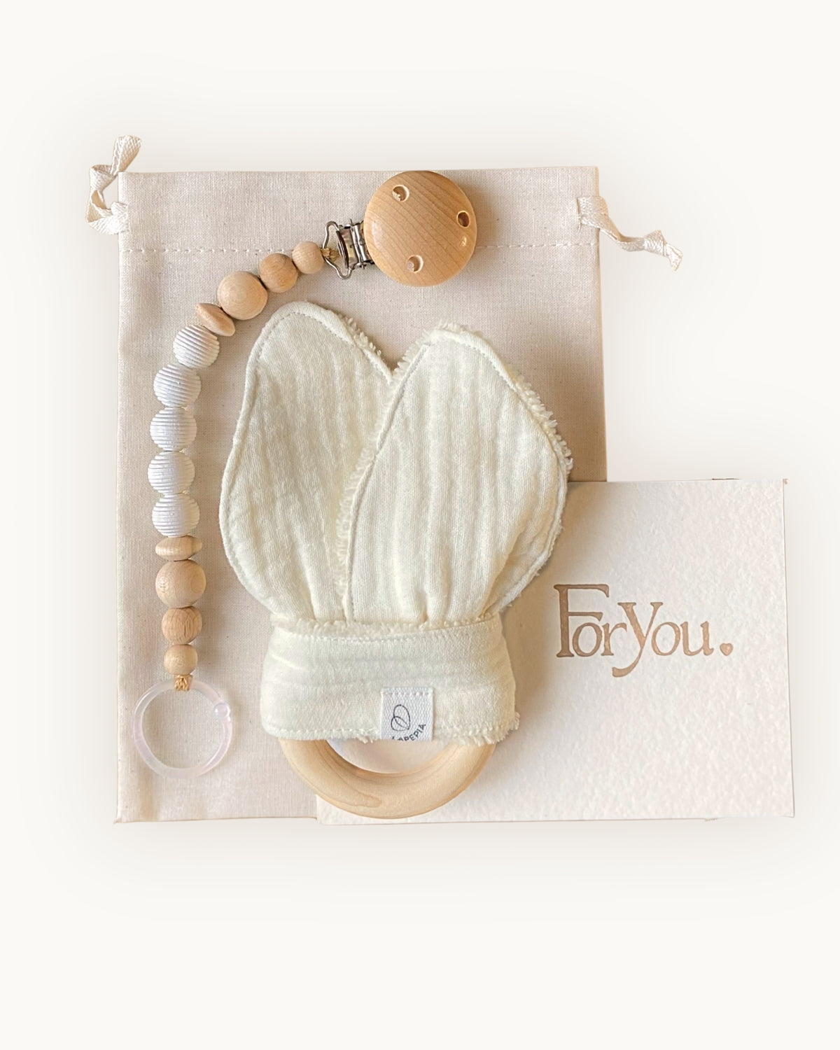 Cofanetto Little Wonder Box Little Treasures, variante Avorio: anello dentizione, clip portaciuccio e custodia in cotone
