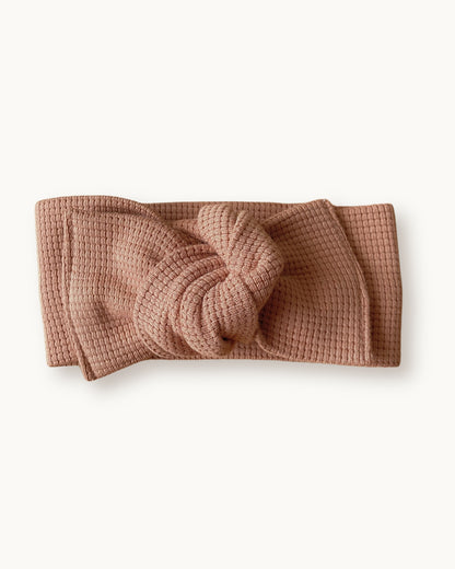 Fascia per capelli da neonata in jersey di cotone nido d'ape colore rosa pesca